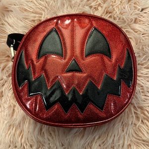 Love, pain, & stitches red glitter purse